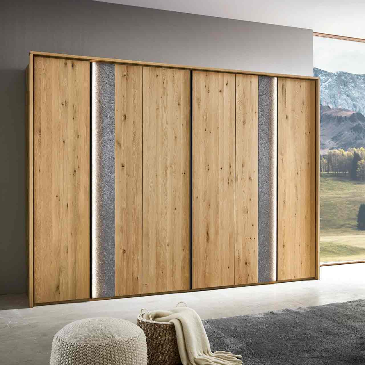 Drehtürenschrank WSM 5100 Hier planen Sie Ihr Kleiderschrank mit echt Steinfunier Akzent in verschiedenen Größen.